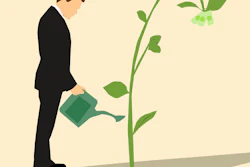 man-watering-plant