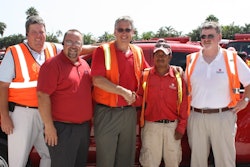 Delray Beach, Florida, winner Jose M. Carrillo stands with ValleyCrest managers in front of his new truck.