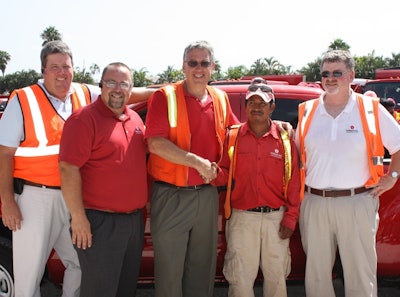 Delray Beach, Florida, winner Jose M. Carrillo stands with ValleyCrest managers in front of his new truck.