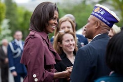 Michelle Obama talks with veterans.