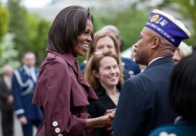 Michelle Obama talks with veterans.
