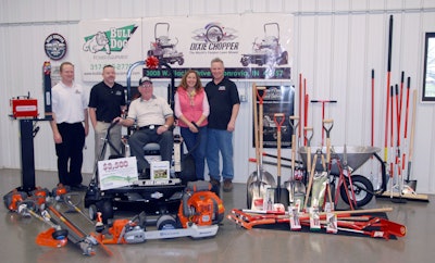 Pictured left to right are Dixie Chopper’s Mark Meyers, Dixie Chopper’s Kraig Richmond, Schubert, Bull Dog Power Equipment’s Joan Biddle and Bull Dog Power Equipment’s Bill Biddle.
