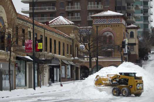 Cat Skid Steer Removes Snow In Kansas