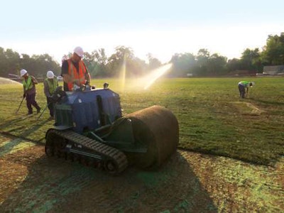 Mc Afee’s Crew Is Laying Down Soil Fibers At The University Of Kentucky Track And Field Complex The Fibers Help Absorb The Blows From Objects Such As Shot Put And Discus And Protect The Turf Sod Is Subsequently Laid On Top Of It