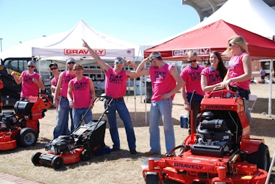 Students take photos wearing Gravely’s pink T-shirts and share them on Facebook to raise money for the Academic Excellence Foundation scholarship.