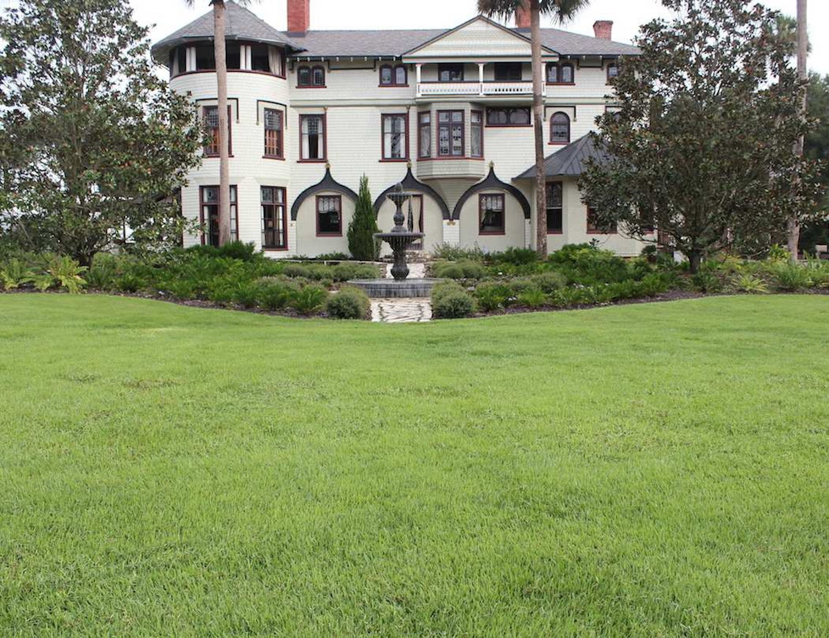 Florida Landscapers Restore Mansion's Lawn | Total Landscape Care