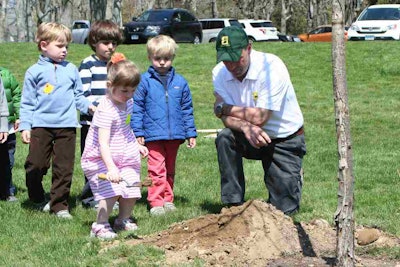 Almstead Tree, Shrub & Lawn Care Co. and a few young assistants donated and planted a tree at the Darien Nature Center in Connecticut.