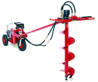 A torque tube connecting the auger to the chassis-mounted engine prevents injury to the operator by absorbing dangerous kickback.