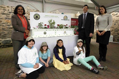 Children created “green thumbs” on a flower box as a gift from Philadelphia — America’s Garden Capital — to First Lady Michelle Obama.