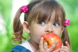 Child eating apple