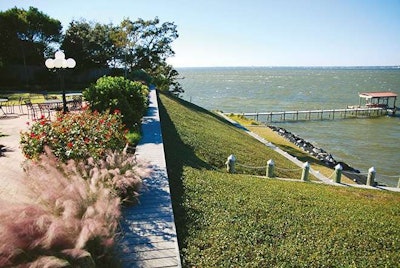There was a heavy emphasis on plants selection to provide different plants that bloom throughout the year, color from annuals and dramatic changes in texture to create a park-like setting or even a botanical garden at this high-end residential estate overlooking the bay.