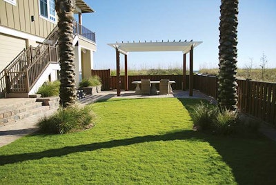 There is only a small area of turf, and the rest of this Pensacola Beach property is planted heavily with natives to stabilize the soil. West and his team learned from the experience that vegetation could literally save homes from storms.