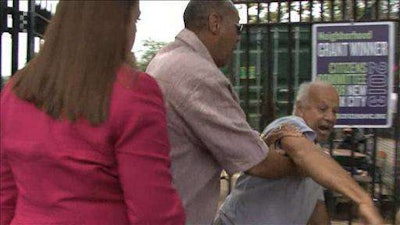 A fight broke out at a news conference by elderly Korean gardeners upset that New York City took control of their park in Flushing, Queens. Credit: The Wall Street Journal