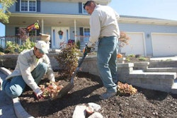 Dean’s Landscaping and Garden Center workers do some fall landscaping for clients. Photo Credit: Tony V. Martin