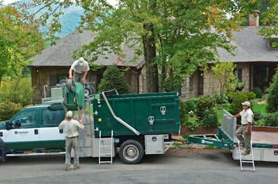 Greenleaf Services uses lightweight, aluminum ladders and foldout steps mounted to the truck to make accessing the truck bed and tool storage easier and safer.