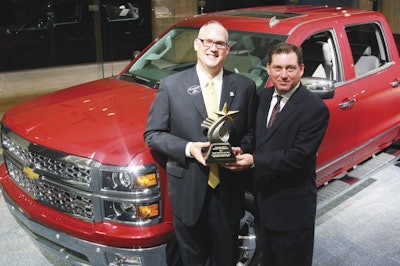 (Left) Ed Peper, U.S. vice president of GM Fleet & Commercial Sales received the Truck of the Year award from Robert Brown Jr., Great Lakes sales manager for Automotive Fleet.