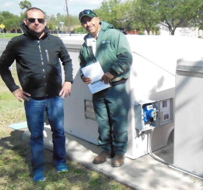 Park manager and Turf Feeding Systems local distributor during fertigation installation.