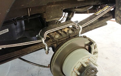 These Hellwig load-leveler helper springs help keep the rear of our Ram 2500 from sagging when loaded down with tools and crew.