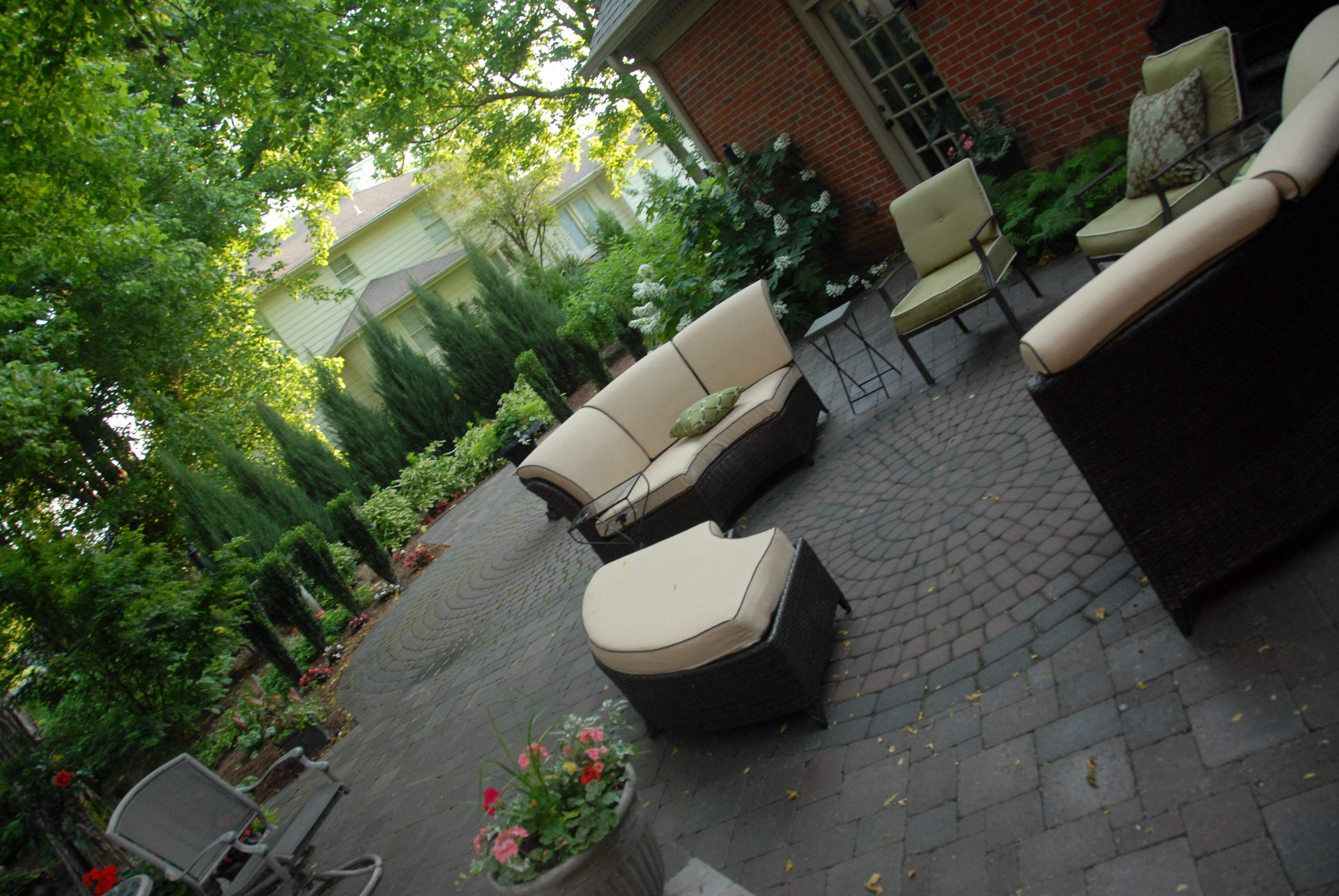 Price 2 The courtyard patio provides plenty of entertaining space and the circle pattern of the pavers help define the separate areas. Semi-circle furniture