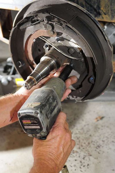 Remove the backing plate mounting nuts.