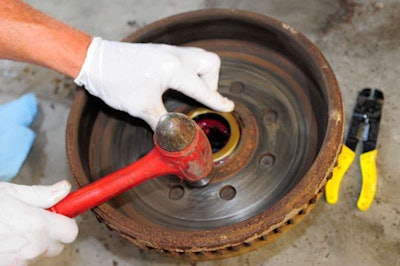 Carefully tap new seal into hub after inner bearing is slipped into place.