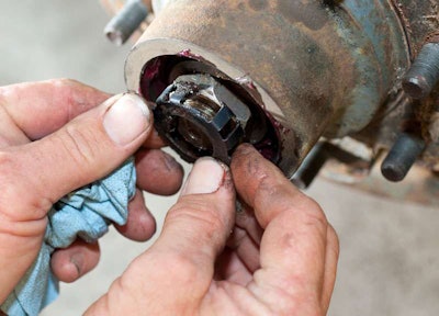 Tighten retaining nut to spec and place cage retainer keeper over it so it doesn’t back off.
