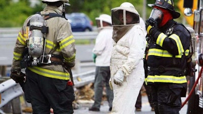 The rig, traveling from Florida to Maine, carried 460 crated hives.