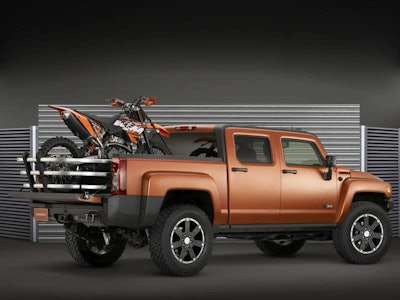 At the 2009 SEMA Show GM had this Hummer H3T Weekend Warrior on display. It was powered by a 365hp 5.3-liter V-8. Modifications include the addition of a 3.5-inch exhaust system, as well as LS2 cylinder heads and a higher-lift camshaft.The Weekend Warrior