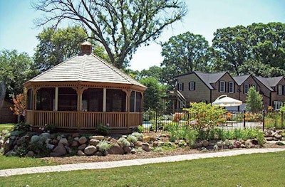 Hanson Landscape takes on challenges with its projects, including a 1,200-square-foot paver patio with 120 tons of granite boulders.