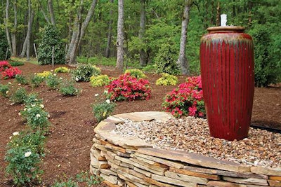 The Blue Thumb fountain was created using an Achelous AquaBox, 1,300-gph PondBuilder Mag-Drive Pump and 43-inch-tall ceramic vase.