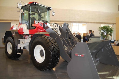 The L60G flag loader, the first wheel loader produced at the Shippensburg factory, was custom painted with U.S. and Canadian flags by Volvo employees.