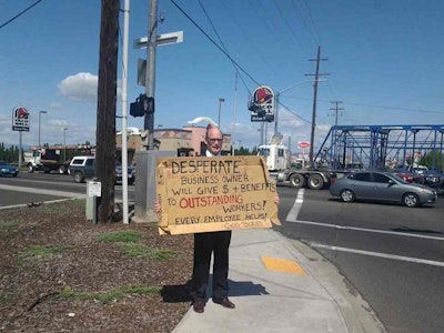 Lance Forsee stood on the street corner with a cardboard sign to fill six job openings at his business. He ended up getting 200 applications.