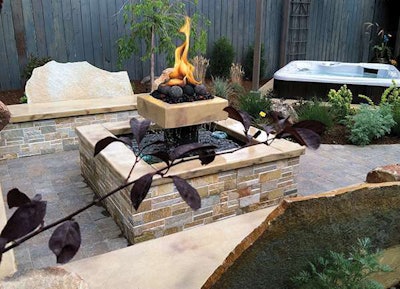 The fire/water features was combined to save space in this small backyard.
