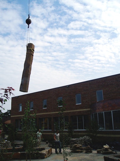 A 75-ton crane placed the 1- and 3-ton rocks.