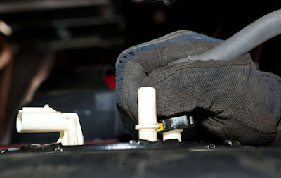 Step 2 Fuel Tank Top Fittings: Reach On Top Of The Forward Section Of The Tank And Carefully Disconnect The Supply And Return Lines From The Tank Disconnect The Sending Unit Plug