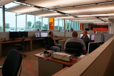 With no big cubicles, employees can easily talk and collaborate.
