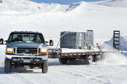 Accelerating the tow vehicle while keeping its wheels pointed straight is the best way to bring a sliding trailer under control according to winter driving experts.