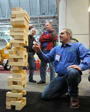 New England Grows trade show attendees stopped by the RISE booth to play Jenga and talk with RISE staff about pesticide and fertilizer issues, and the importance of grassroots engagement in advocacy efforts.