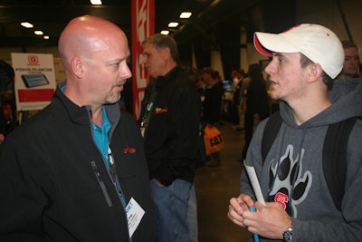 Justin Morgan, North Carolina State University student, talks with Greg Clayton, of Ariens, at the Career Fair. Photo: PLANET