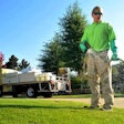guy-spraying-lawn