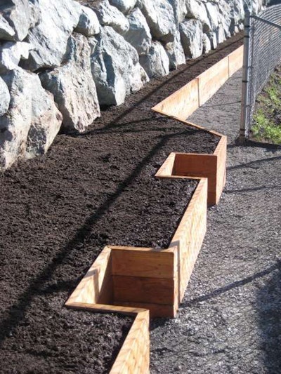 Raised cedar beds for edibles can be customized to any size and shape to take advantage of an otherwise unusable space. Photo: Seattle Urban Farm Company