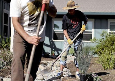 Kurt Christiansen of Christiansen Associates joins local landscapers to at the Santa Cruz County Animal Shelter. Photo: Kevin Johnson, Santa Cruz Sentinel.