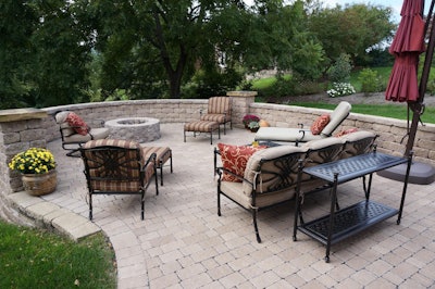 Creating an outdoor space for clients has become a popular trend in the Roanoke area. This particular project features a patio with a parapet wall, column kits and a firepit.