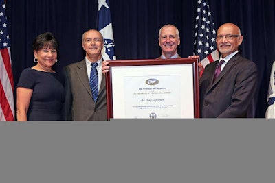 U.S. Secretary of Commerce Penny Pritzker (far left) and Assistant Secretary of Commerce Arun Kuman (far right) present the President’s “E” Award for excellence in exporting to Paul Gannom (near left), Ace Pump’s export manager, and Roy Bell III (near right), the company’s CEO, at a recent ceremony in Washington.