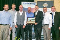 Pictured with representatives from Nexeo Solutions and Johnson Controls, Stuart Hughes (executive vice president of manufacturing operations), Roger Myerly (facility manager) and Steve Vernon (vice president of finance) of JCB North America hold the Savannah Chamber of Commerce’s Environmental Awareness Award.