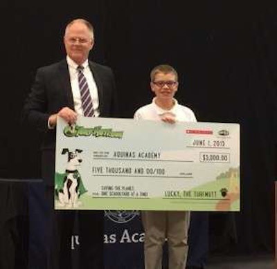 Winner Liam Ellis poses with OPEI President and CEO Kris Kiser