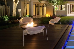 At $2,225, this modern fire-pit vessel features lava rock and serves as the focal point of an outdoor space created by Phil Kean Designs. Photo: Melissa Jones