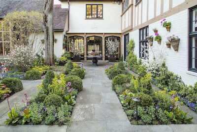 Mariani Landscape’s plantings at the Lake Forest home are bountiful indeed, but without going over the top. Photo: Linda Oyama Bryan