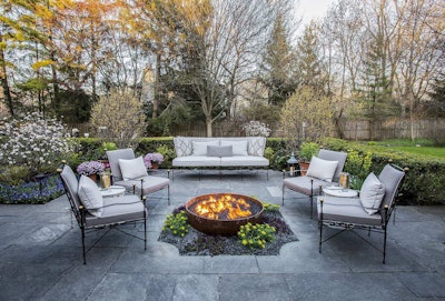 Mariani Landscape and Frank Ponterio Interior Design worked together on the garden areas of the Lake Forest home. Photo: Linda Oyama Bryan
