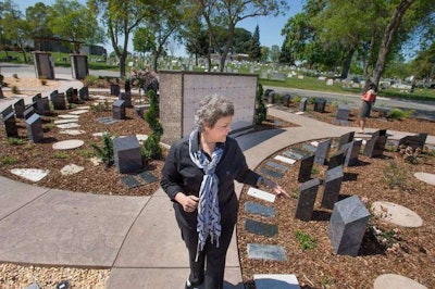 Mulch and other materials are being used to keep cemetery grounds presentable in the face of water restrictions. Photo: Randall Benton, Sacramento Bee